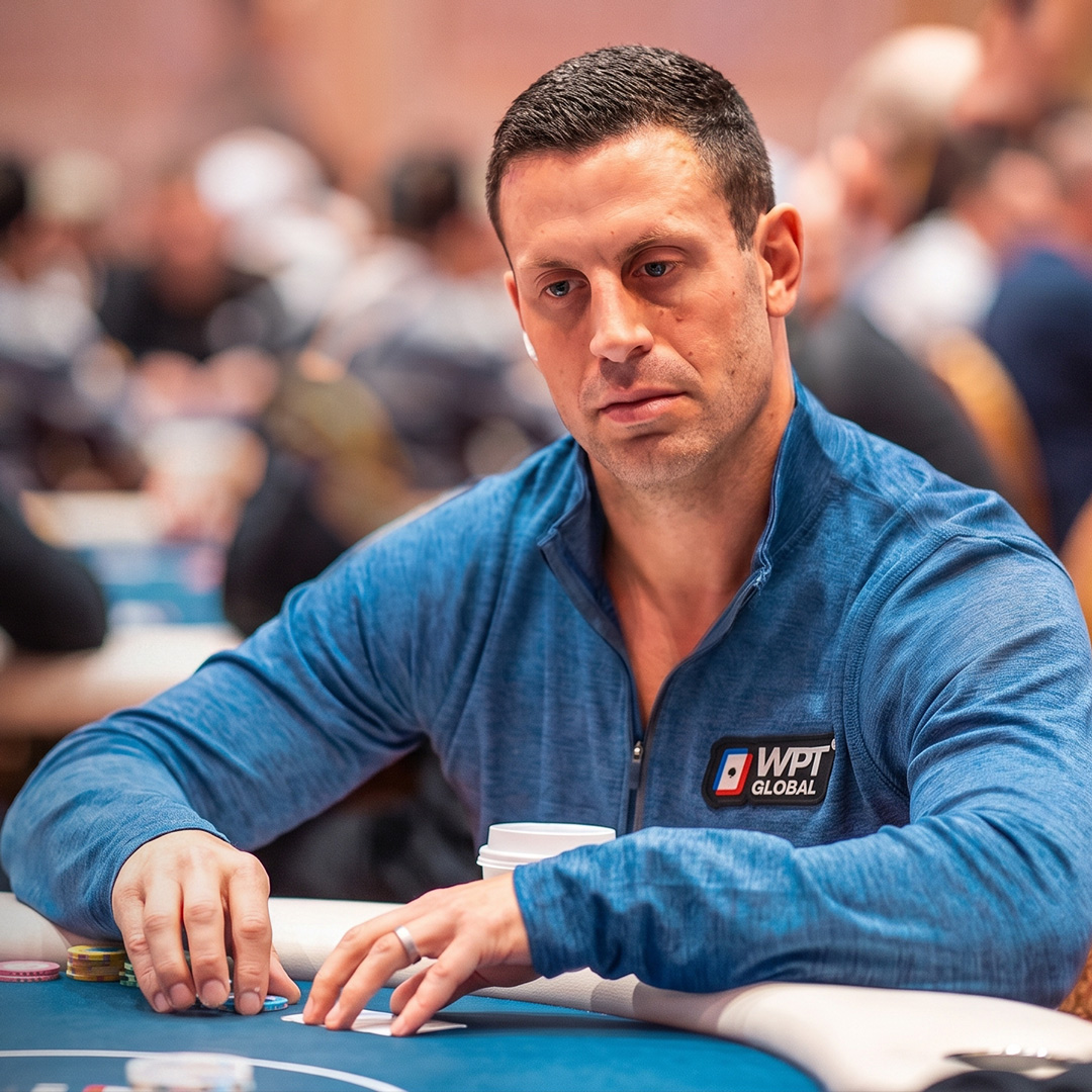Garrett Adelstein competing at a live poker table